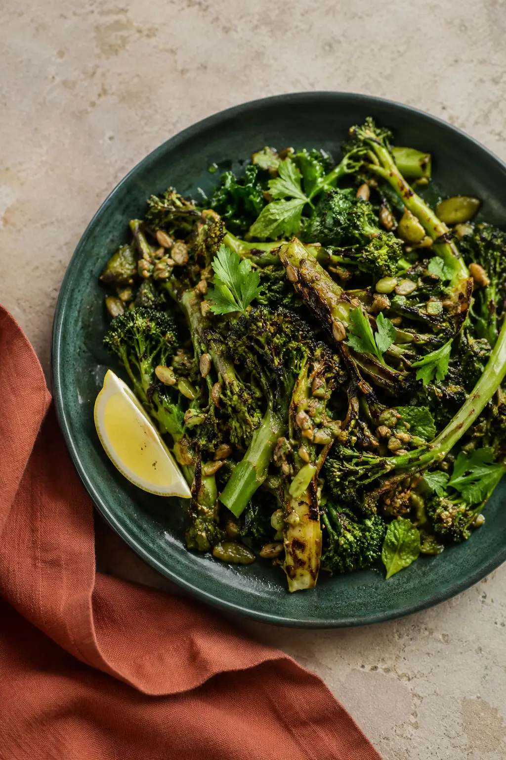 Charred greens with toasted seed dressing